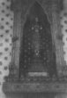 Socha Buddhy na oltáři