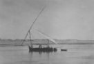 Plachetnice na Nilu s vlečenou loďkou